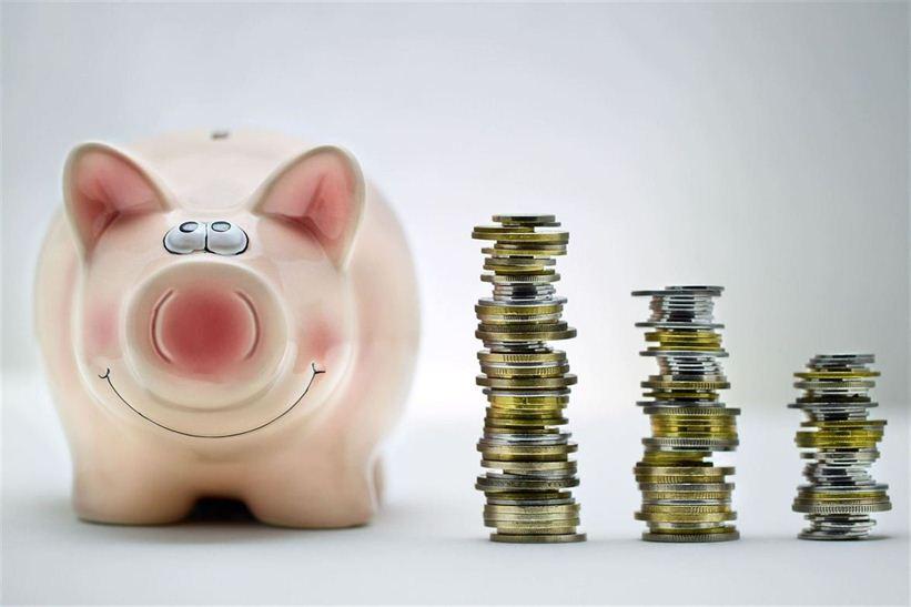 piggy bank and money showing you need to save